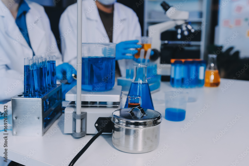 Fototapeta premium Collaboration, tablet or science with people in lab together for research or development. Innovation, tech and microscope with scientist team in clinical trial for planning or medical investigation