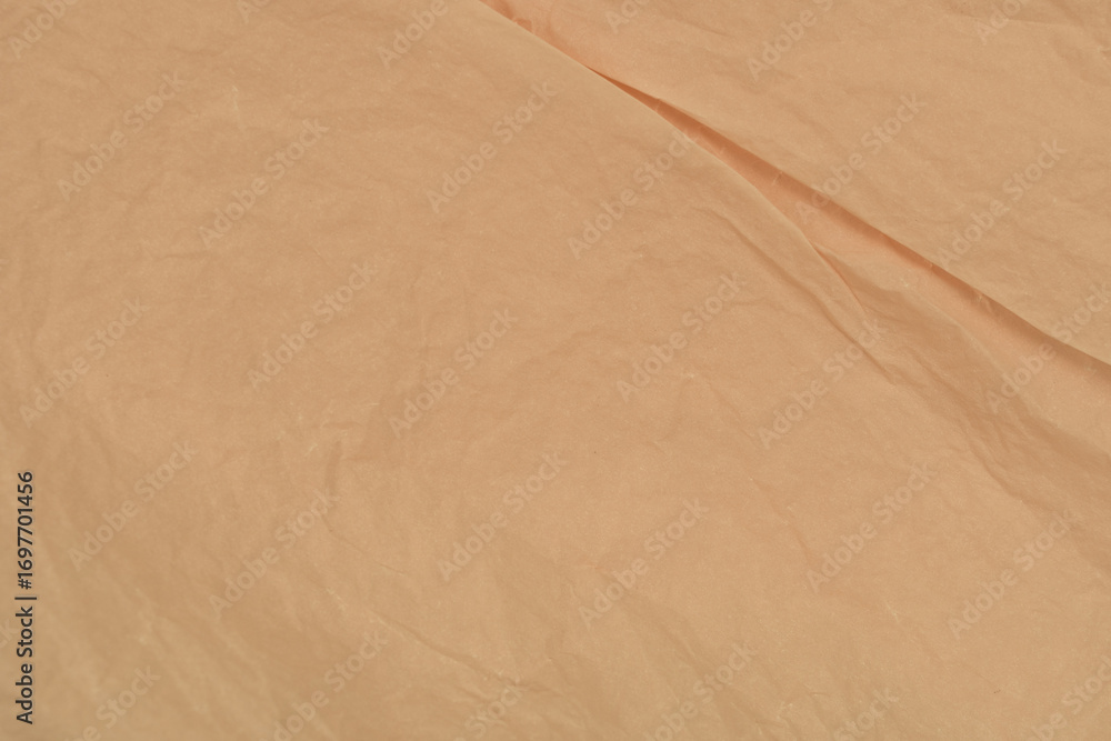 Naklejka premium Beige Crumpled Kraft Paper Texture Background