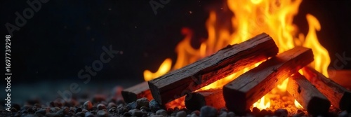 Close-up of vibrant flames licking and consuming a stack of seasoned firewood, emitting warm orange and yellow light against a dark background , warmth, outdoor, detail