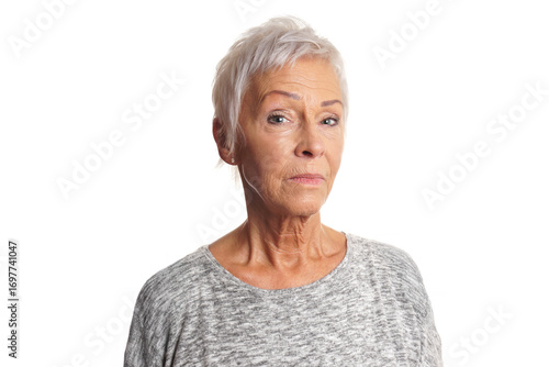 Senior woman expressing doubt with skeptical expression on white background