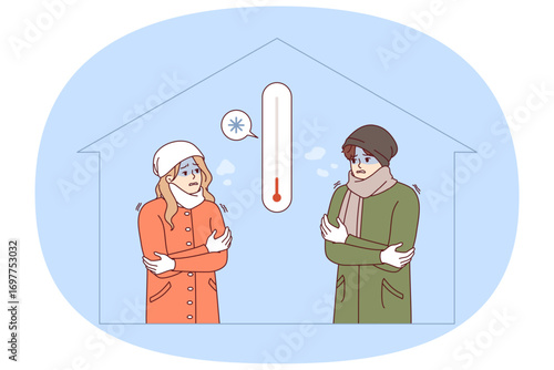 Cold temperature in residential building with shivering man and woman, freezing due to lack of central heating. People suffer because of cold temperatures in apartments and lack of money to heat