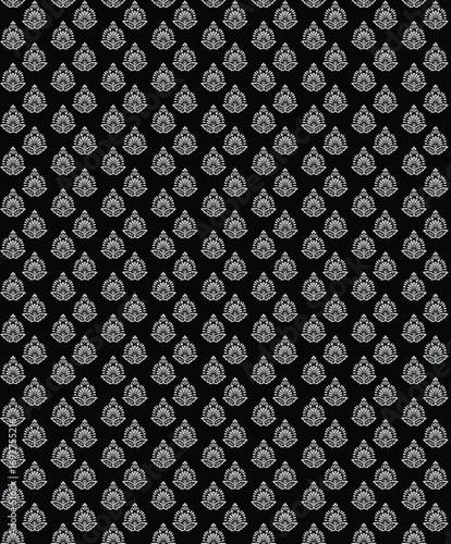 Seamless black and white Indian paisley pattern. This intricate ethnic motif reflects a growing trend for traditional craftsmanship, cultural patterns, and elegant, timeless design in modern applicati