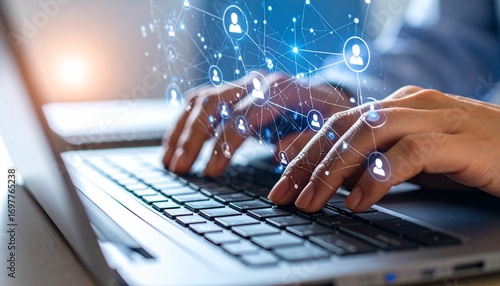 Hands typing on laptop with digital social network overlay