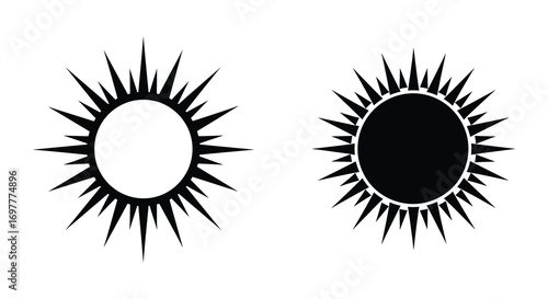 two oval shapes surrounded by sharp spikes contrasted black white