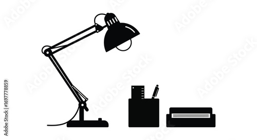 a desk lamp next to stationery items neatly arranged