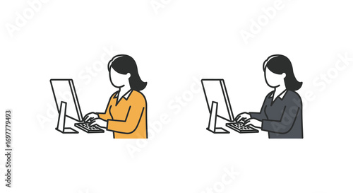 two women working diligently at their computers in an office setting