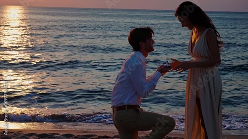 Romantic sunset beach proposal captured from a side angle, highlighting the couple's emotions. Ideal for a heartfelt engagement video scene.