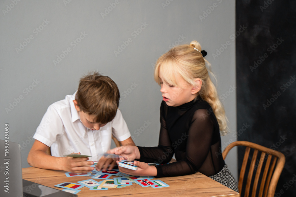 Fototapeta premium Children Playing Cards Home Fun