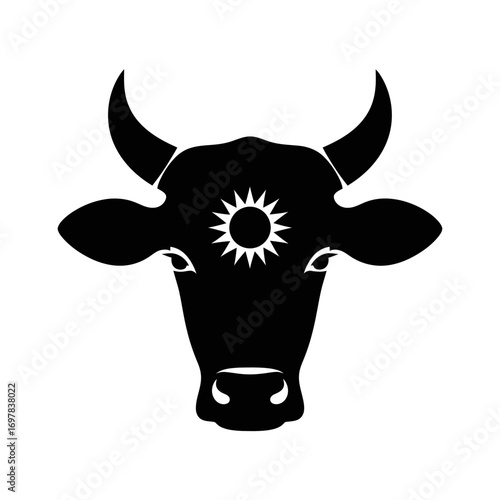 A stylized black silhouette of a cow's head with a sun symbol on its forehead.