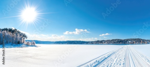 Frozen lake panorama on a sunny winter day