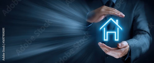 The House Icon Protected by Businessman's Hands Symbolizing Real Estate Security