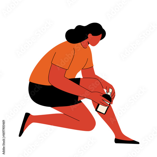Woman applying insect repellent to her legs while kneeling  