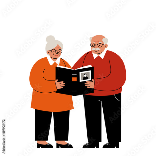 Elderly couple reading photo album together while standing indoors  