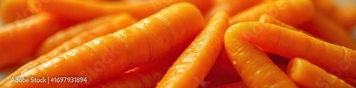 Close-up of vibrant orange salad carrots, freshly washed and ready to be used in a healthy recipe Their smooth skin and bright color are appealing and show their freshness , garden, beta-carotene