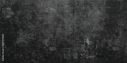 Dark gray vintage grunge stone wall texture with an aged, rough surface and black paint frame backdrop