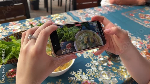 Woman takes photo of food cooked by her in trendy for social media 