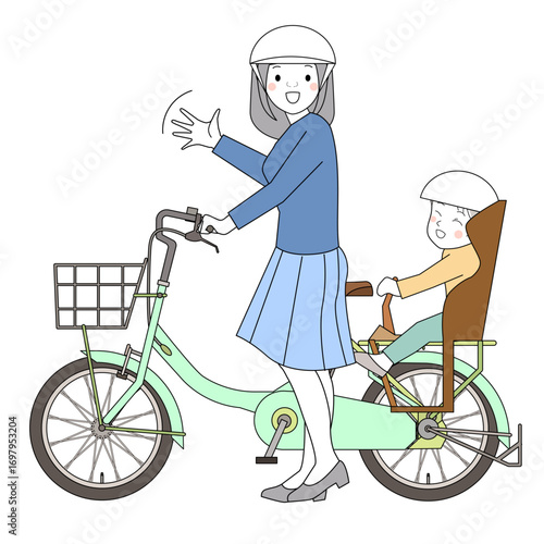 自転車で子供を保育園に送る主婦