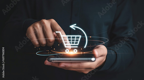 Person holding a smartphone with a glowing shopping cart icon and circular arrow symbolizing online shopping and e commerce