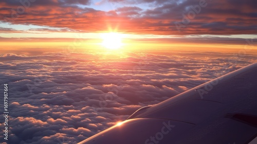 Aerial Sunset: Golden Light Above Cloud Sea, Airplane Wing Perspective.