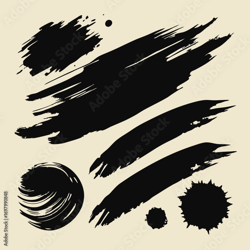 Collection of black paint brush strokes and splatters on a light beige background, artistic design elements.
