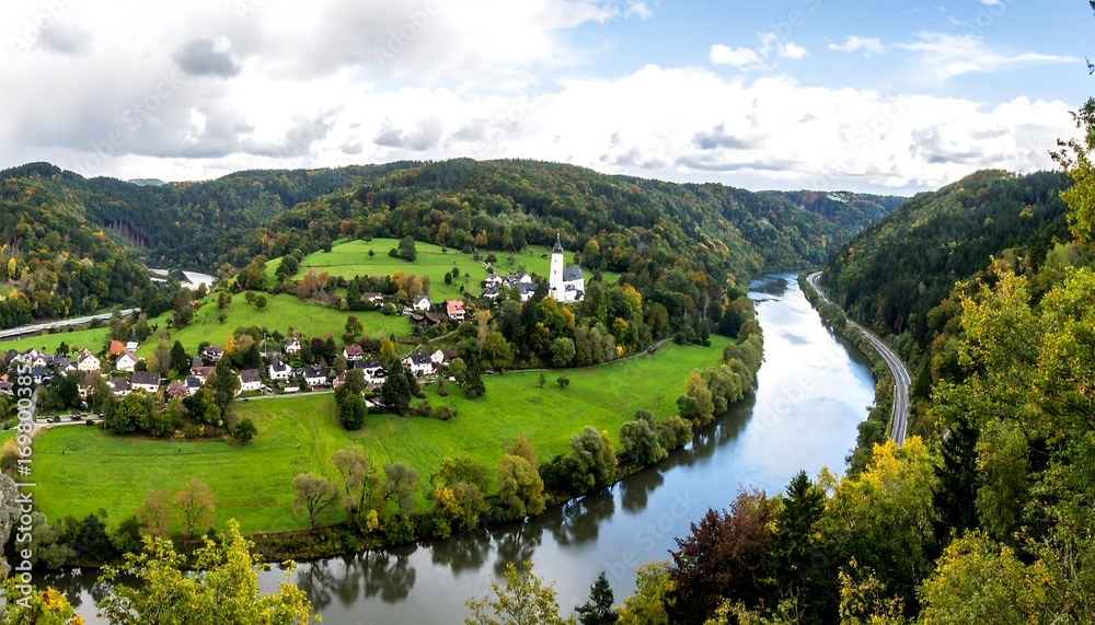 Naklejka premium Panoramic view of a river valley with autumn colors