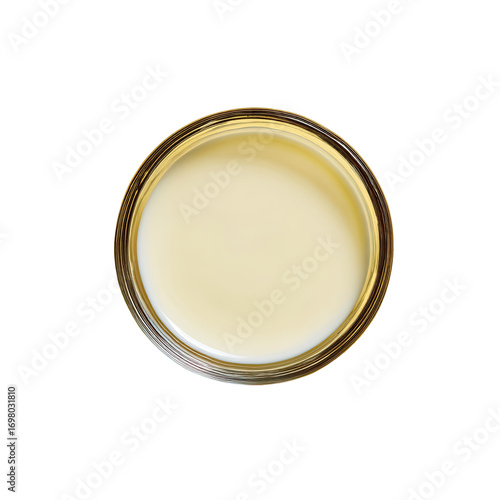 Creamy, pale yellow substance in a glass jar.  Smooth, uniform texture.  Top view