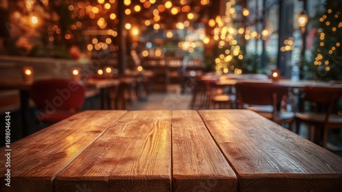 Wooden table in a cafe, warm lights