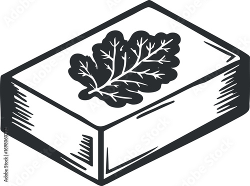 Illustration of a block with a fresh green leaf on top, ideal for culinary themes. Black on transparent background.