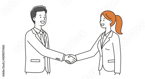 Man and woman in suits shake hands