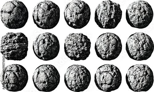 Close-up view of textured spherical objects, possible ancient artifacts or decorative items, showing intricate patterns and designs.