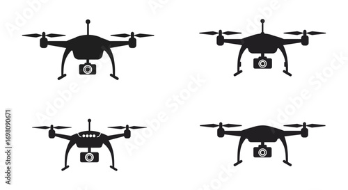 four drones with cameras arranged neatly in a grid
