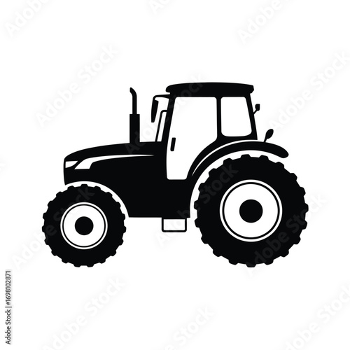 Classic black silhouette of a farm tractor