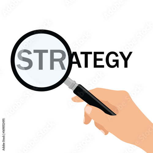 Hand holding magnifying glass, strategy word zoomed. Business concept, focus on strategy, search or planning idea