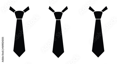 three black ties neatly arranged side by side
