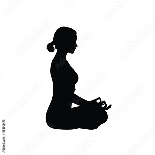 Silhouette of a woman in a meditative pose, promoting mindfulness and wellness