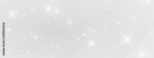 Bright Christmas flare effect with glowing stardust, golden shimmer particles and shining glitter isolated in elegant luxury holiday background for party and New Year.