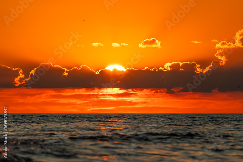 Fototapeta Naklejka Na Ścianę i Meble -  Sunset on the Baltic Sea beach in the Jastrzebia Gora, Poland