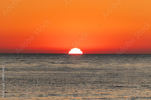 Fototapeta Naklejka Na Ścianę i Meble -  Sunrise on the Baltic Sea beach in the Jastrzebia Gora, Poland