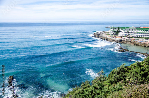 Canvas Print Atlantic swells at Praia Grande and oceanfront hotel, Sintra coast