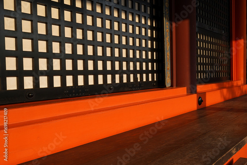 Wall of Japanese Buddhist Temple in Sunset Light. Traditional Architecture and Spiritual Heritage