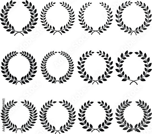 A vintage vector illustration set of round laurel wreath frames with ornate leaf and branch decoration