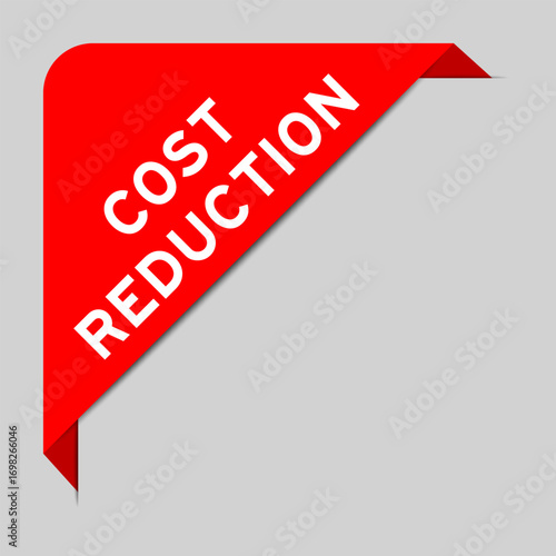 Red color of corner label banner with word cost reduction on gray background