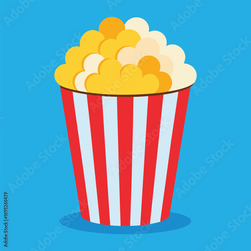 A classic red and white striped popcorn bucket overflowing with freshly popped kernels a perfect snack for movie nights and entertainment isolated on a vibrant blue background