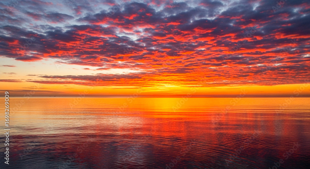 Naklejka premium sunset over the sea background image