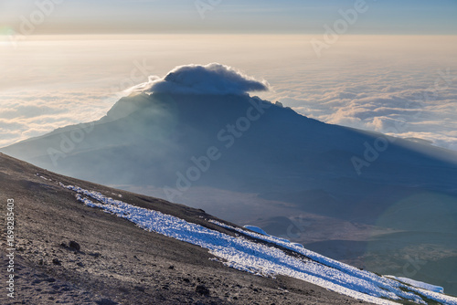 Mount Kilimanjaro hiking trail, way to the summit of mount Kili the highest volcano in Africa, Tanzania. View from top of mountain Kilimanjaro. Snow and glacier on top of Kilimanjaro, Mount Kili