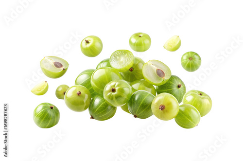 A delightful pile of fresh green amla fruits, whole and sliced