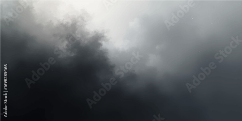 Dramatic mist and light breaking through the dark, cloudy forest backdrop