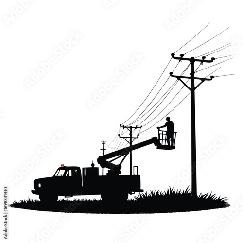 Silhouette of utility worker in bucket truck repairing power lines