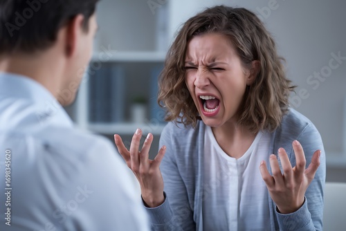 A Woman Expresses Intense Anger and Frustration During a Confrontational Therapy Session.