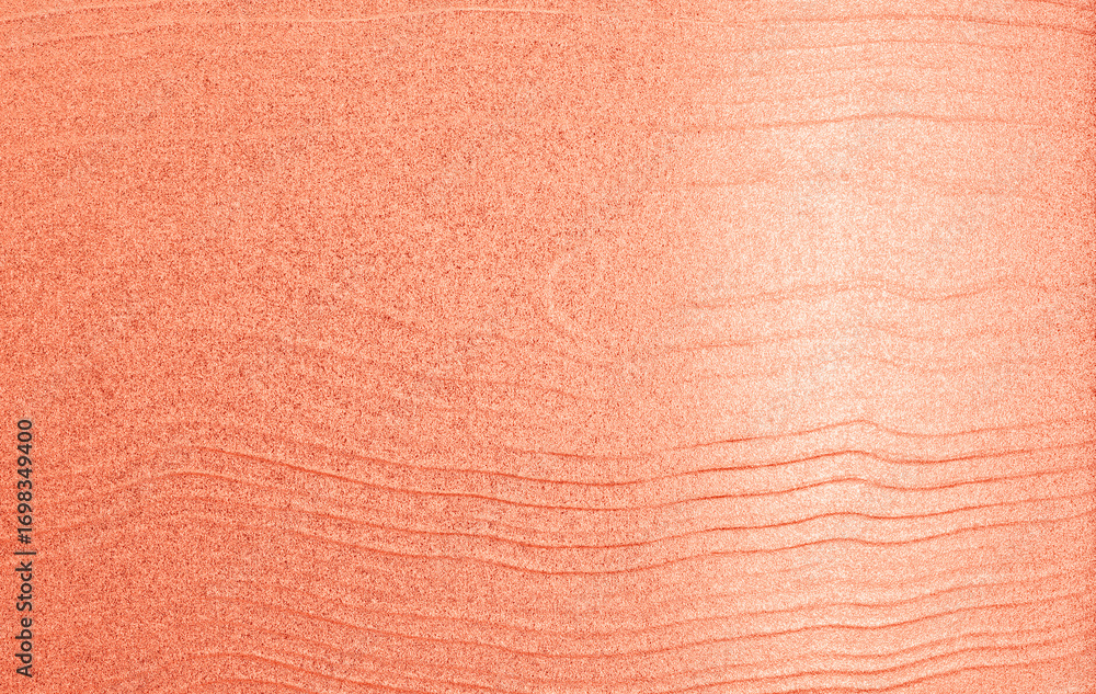 Fototapeta premium Peach paper texture with subtle grain and soft surface, elegant pastel background for design, stationery, and decoration.